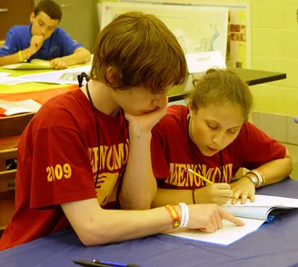 Students working on groundwater cross word puzzle
